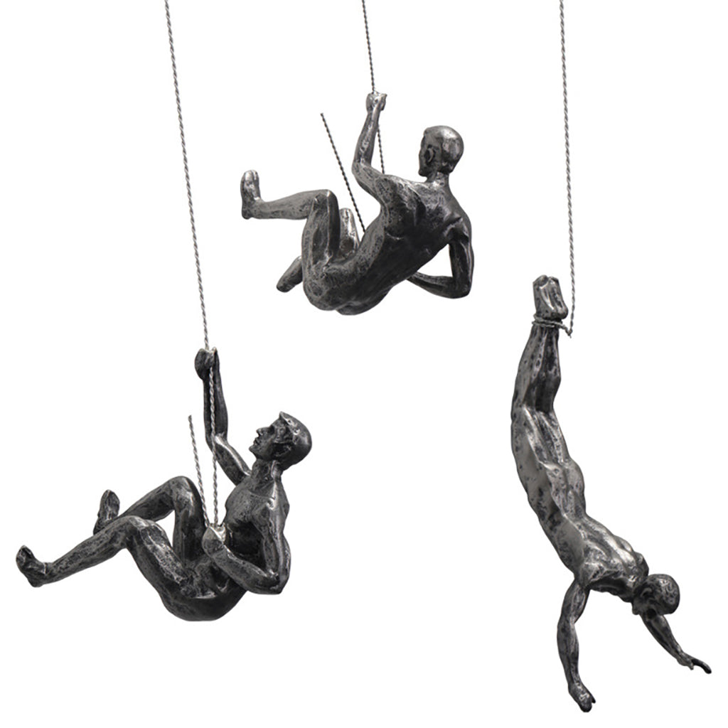 climbing man wall sculpture