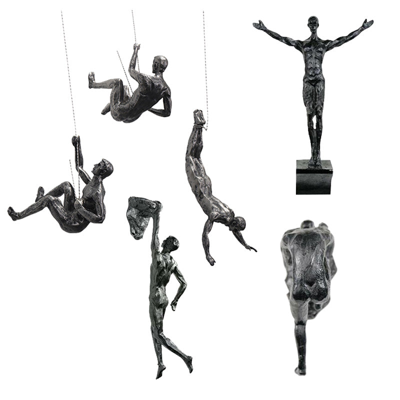 climbing man wall sculpture
