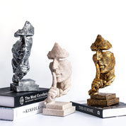 Silence Is Gold Statue