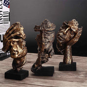 Silence Is Gold Statue